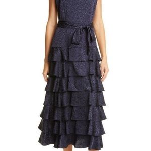 LIKELY NAVY DRESS WORN ONCE. FLUTTER STRAPS, BELT